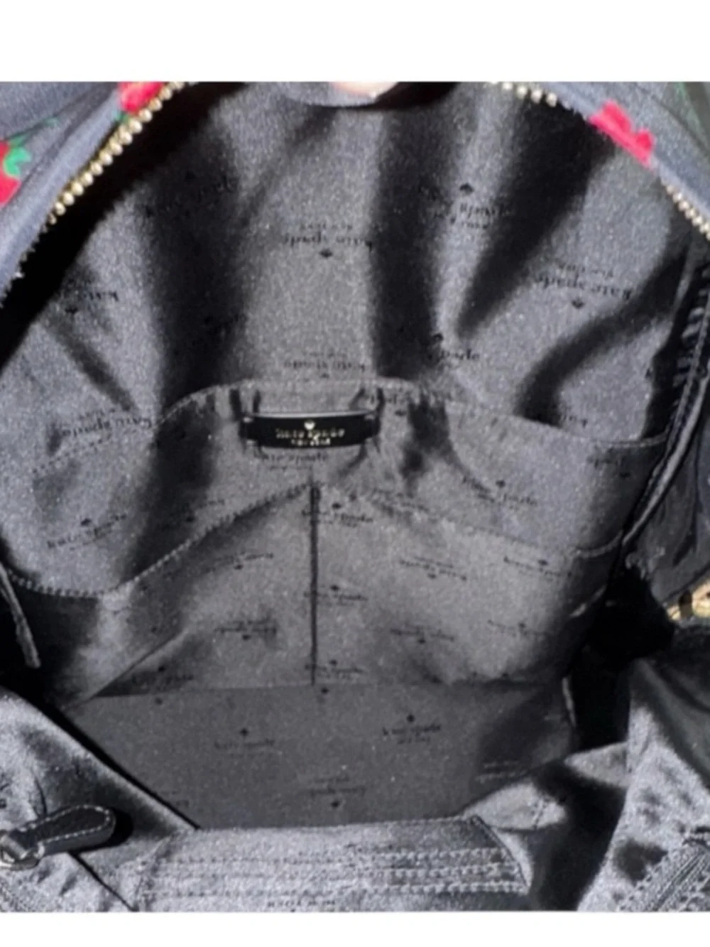 kate spade - Chelsea Med backpack with red rose print.